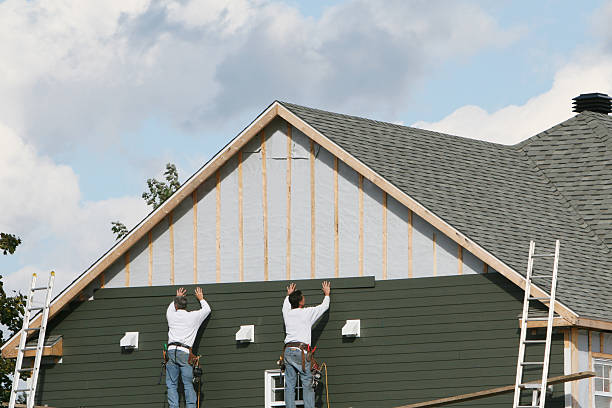 Professional Emergency Siding Repair technician working in Huron, OH